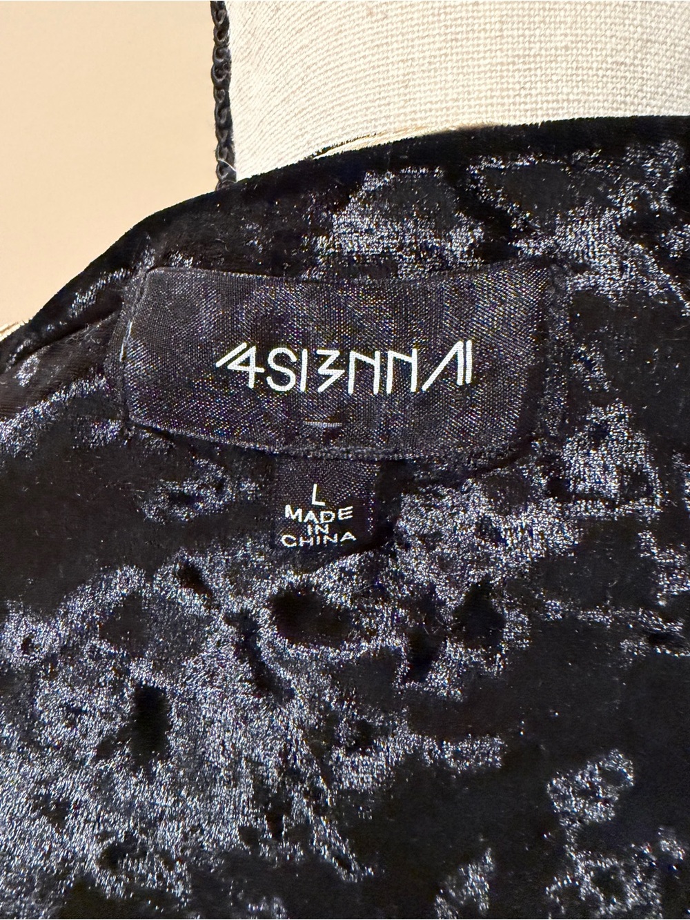 Label inside women's velvet jacket